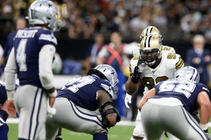 Dallas Cowboys quarterback Dak Prescott (4) looks over the New Orleans defense. Mandatory Credit: Chuck Cook-USA TODAY
